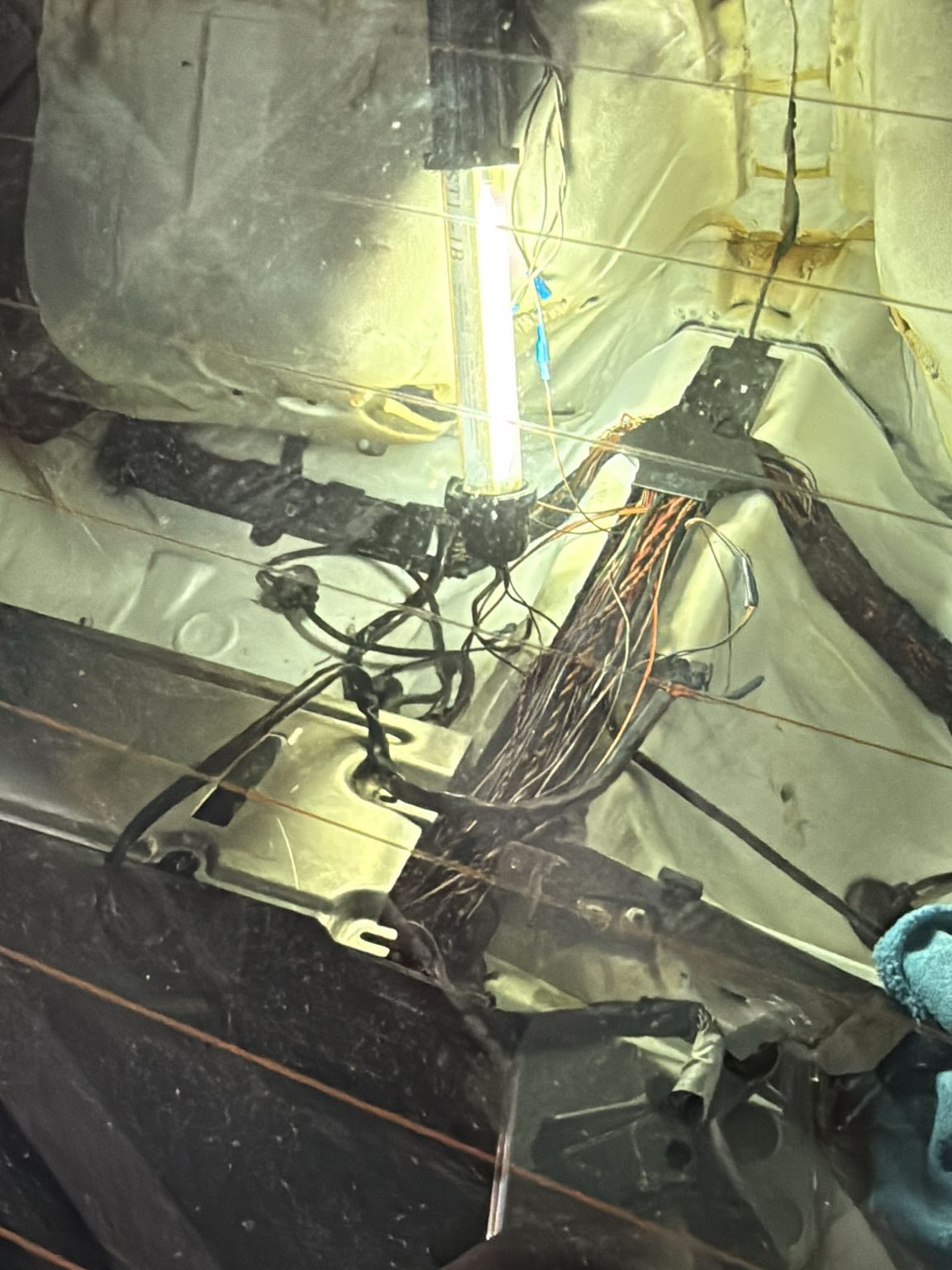 Exposed wiring in a Porsche 997.2 GTS