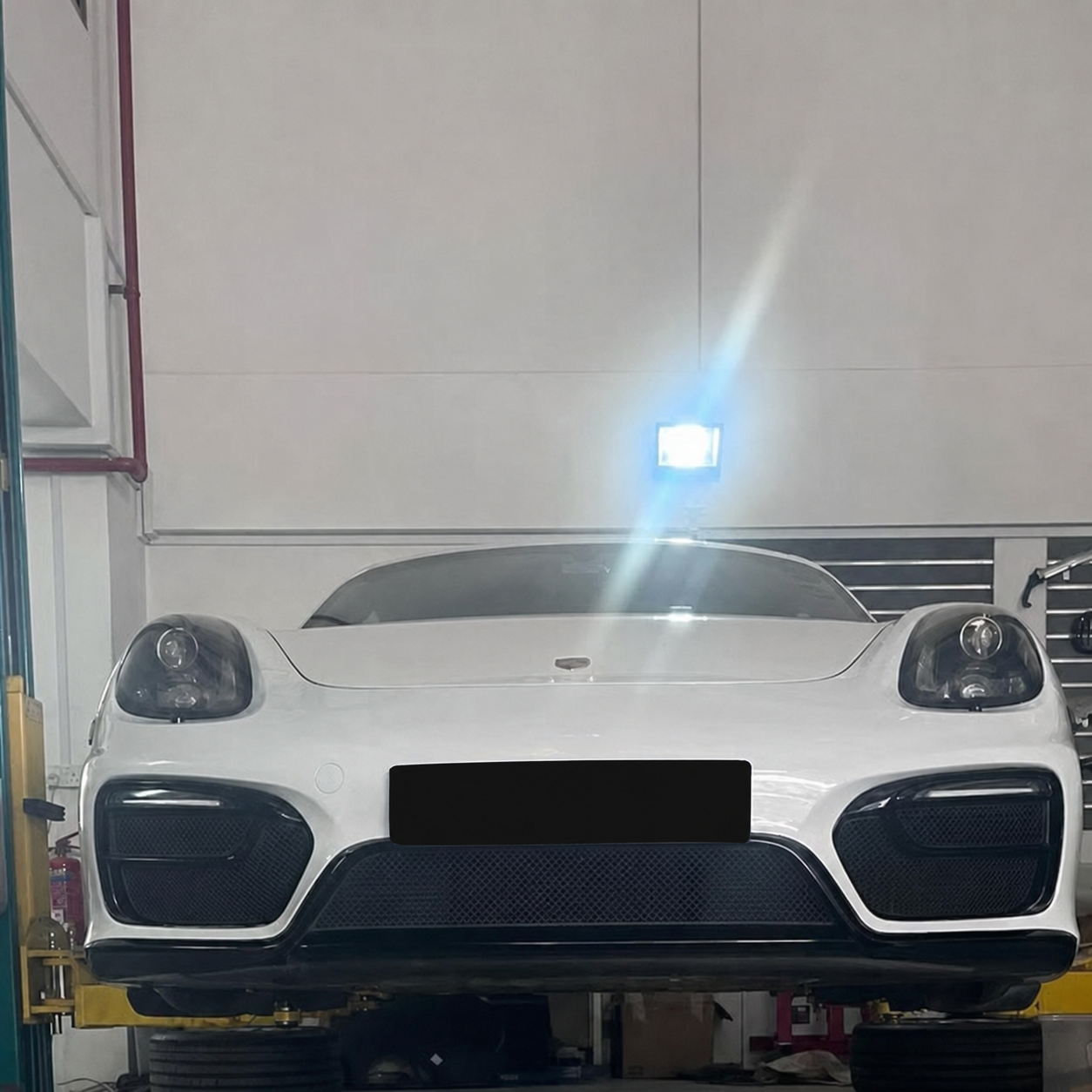 Porsche Cayman GTS with its registration plate blacked out