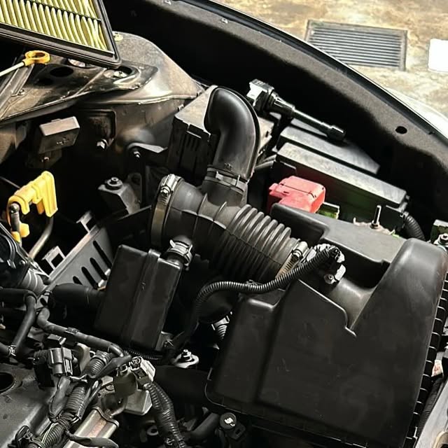 Nissan Teana engine bay during comprehensive maintenance