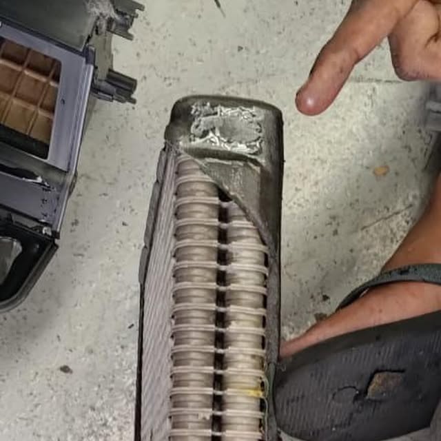 Removed air-conditioning cooling coil from a Nissan Teana