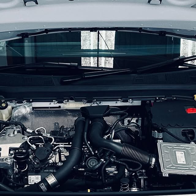 Mercedes-Benz A200 engine bay during coolant-leak repair