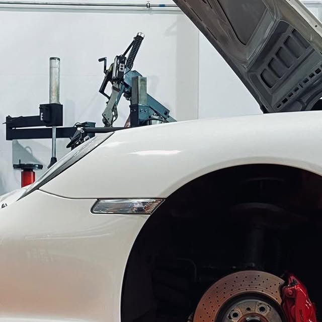 Porsche 997 with wheel removed during first maintenance